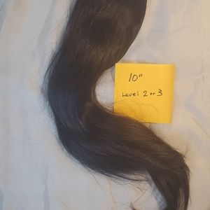 Human hair, black, thick,  hair addition on a pin in base.